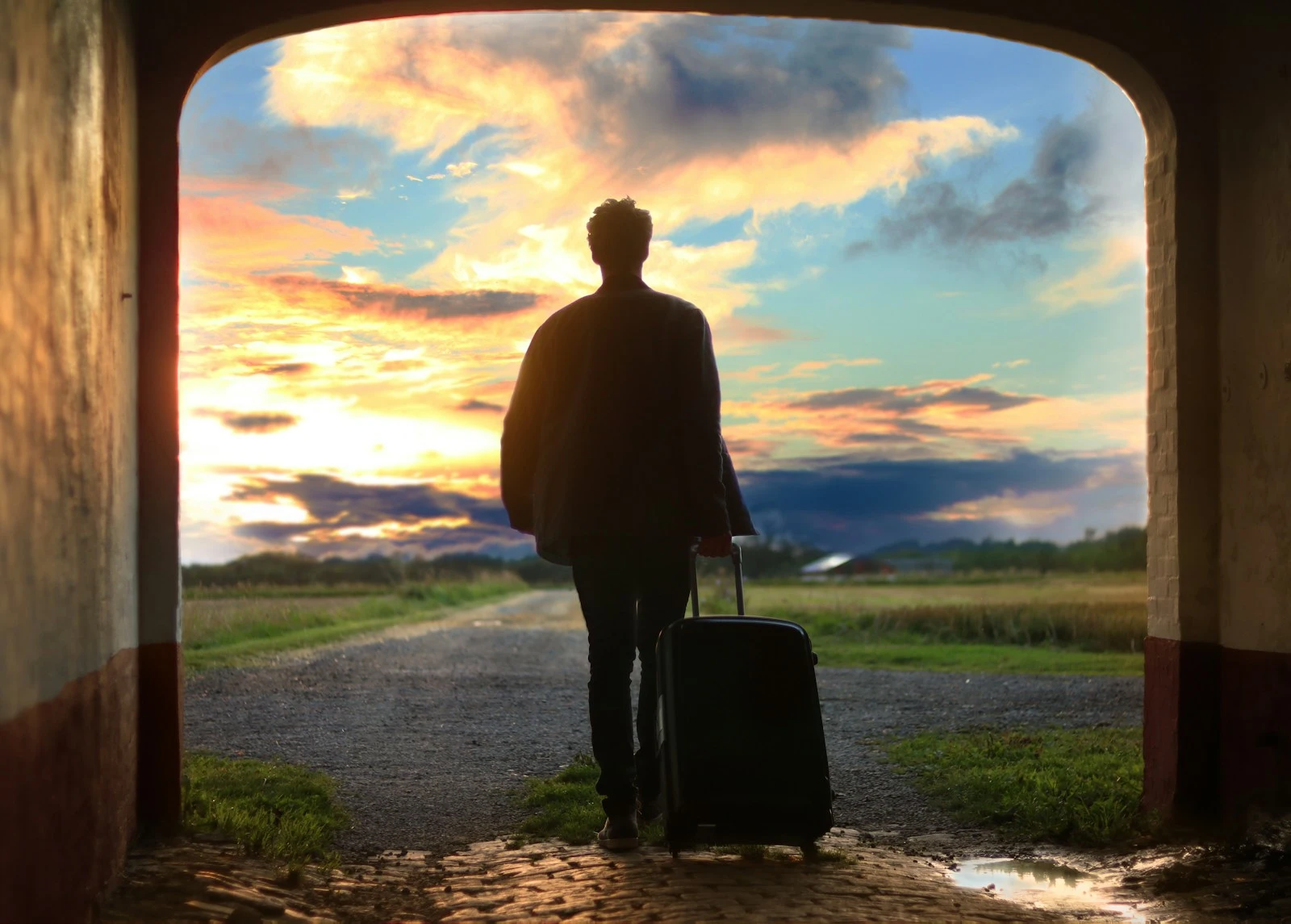 A solo traveller enjoying a serene mountain vista, representing the peace of mind our service provides.